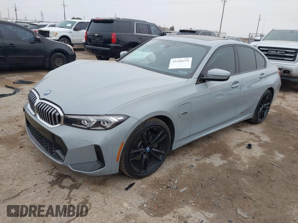 2023 BMW 3 Series 330e with VIN 3MW39FF00P8D57706, listed as a IAAI auction lot 41560259 with 1 mi miles. Bid and sale history available at carsss.com. Image 2.