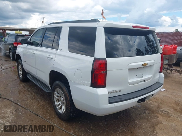 2016 Chevrolet Tahoe LT with VIN 1GNSKBKC0GR227451, listed as a IAAI auction lot 42241120 with 243,354 mi miles and . Bid and sale history available at DreamBid. Image 3.