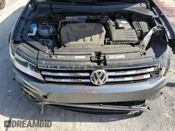2018 Volkswagen Tiguan SEL z VIN 3VV3B7AX2JM016874, wystawiony jako Copart lot #54525515 z przebiegiem 87 472 mil mil oraz Nie do naprawy • Non repairable. Historia ofert i sprzedaży dostępna na DreamBid. Obrazek 12.