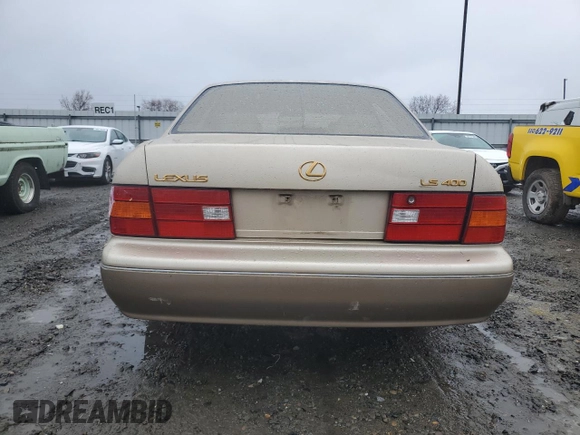 2000 Lexus LS 400 z VIN JT8BH28F2Y0180338, wystawiony jako Copart lot #46099195 z przebiegiem 241 041 mil mil oraz Szkoda całkowita • Salvage title. Historia ofert i sprzedaży dostępna na DreamBid. Obrazek 6.