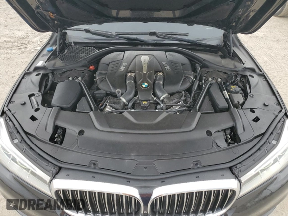 2016 BMW 7 Series 750i z VIN WBA7F0C51GGL99505, wystawiony jako Copart lot #49775245 z przebiegiem 46 703 mil mil oraz Szkoda całkowita • Salvage title. Historia ofert i sprzedaży dostępna na DreamBid. Obrazek 13.