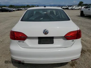 2014 Volkswagen Jetta SE with VIN 3VWD17AJ2EM391314, listed as a Copart auction lot 57357575 with 131,968 mi miles and Salvage title. Bid and sale history available at DreamBid. Image 6.
