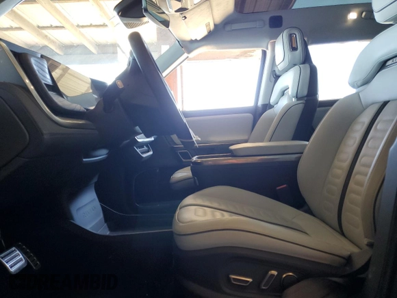 2022 Rivian R1T Adventure Package with VIN 7FCTGAAA8NN014044, listed as a Copart auction lot 49919865 with 0 mi miles and Salvage Title. Bid and sale history available at carsss.com. Image 7.