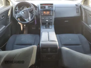 2015 Mazda CX-9 Sport с VIN JM3TB2BA4F0450064, выставлен на аукционе Copart как лот 86707144 с пробегом 163 743 миль миль и Списание • Salvage title. История ставок и продаж доступна на DreamBid. Изображение 8.