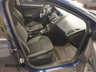 2012 Ford Focus SE z VIN 1FAHP3F24CL163493, wystawiony jako IAAI lot #42460399 z przebiegiem 147 016 mil mil oraz . Historia ofert i sprzedaży dostępna na DreamBid. Obrazek 5.