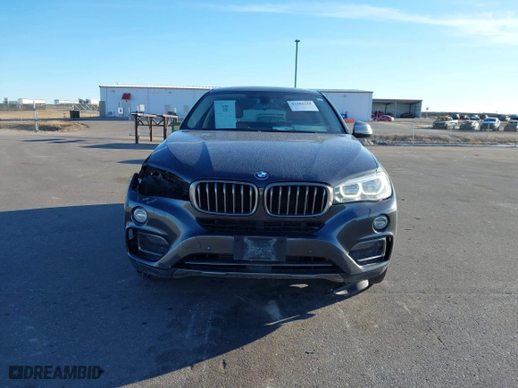 2015 BMW X6 xDrive35i with VIN 5UXKU2C50F0N77926, listed as a IAAI auction lot 41681268 with 136,118 mi miles. Bid and sale history available at carsss.com. Image 12.
