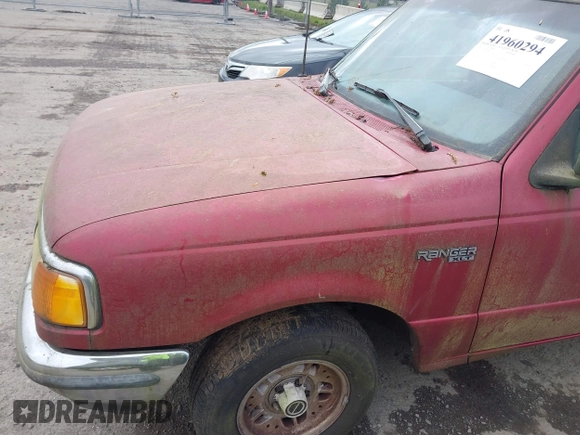 1993 Ford Ranger STX z VIN 1FTCR14X4PPB32017, wystawiony jako IAAI lot #41960294 z przebiegiem 50 331 mil mil oraz . Historia ofert i sprzedaży dostępna na DreamBid. Obrazek 6.