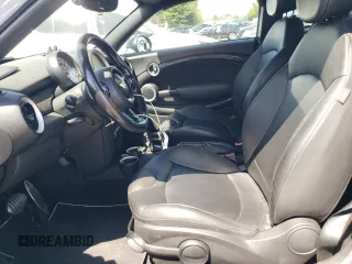 2012 MINI Coupe S z VIN WMWSX3C59CT465700, wystawiony jako Copart lot #52966245 z przebiegiem 136 253 mil mil oraz Szkody całkowita. Historia ofert i sprzedaży dostępna na DreamBid. Obrazek 7.