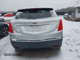 2017 Cadillac XT5 Luxury AWD z VIN 1GYKNDRS6HZ247580, wystawiony jako IAAI lot #41600234 z przebiegiem 82 480 mil mil oraz . Historia ofert i sprzedaży dostępna na DreamBid. Obrazek 16.