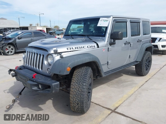 2015 Jeep Wrangler Unlimited Rubicon Hard Rock с VIN 1C4HJWFG6FL762537, выставлен на аукционе IAAI как лот 41792066 с пробегом 125 829 миль миль и . История ставок и продаж доступна на DreamBid. Изображение 17.