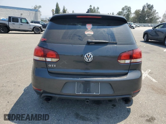 2010 Volkswagen Golf GTI z VIN WVWGD7AJ1AW211757, wystawiony jako Copart lot #64498075 z przebiegiem 147 531 mil mil oraz Szkoda całkowita • Salvage title. Historia ofert i sprzedaży dostępna na DreamBid. Obrazek 6.