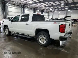 2014 Chevrolet Silverado 1500 LT with VIN 3GCUKREC0EG294862, listed as a Copart auction lot 57144794 with 115,009 mi miles and Salvage Title. Bid and sale history available at DreamBid. Image 2.