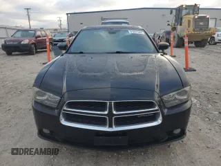 2012 Dodge Charger SXT with VIN 2C3CDXJG1CH240409, listed as a Copart auction lot 81831584 with 185,527 mi miles and Clean Title. Bid and sale history available at carsss.com. Image 5.