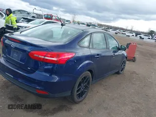 2016 Ford Focus SE with VIN 1FADP3F27GL254679, listed as a IAAI auction lot 41941314 with 72,609 mi miles. Bid and sale history available at carsss.com. Image 4.