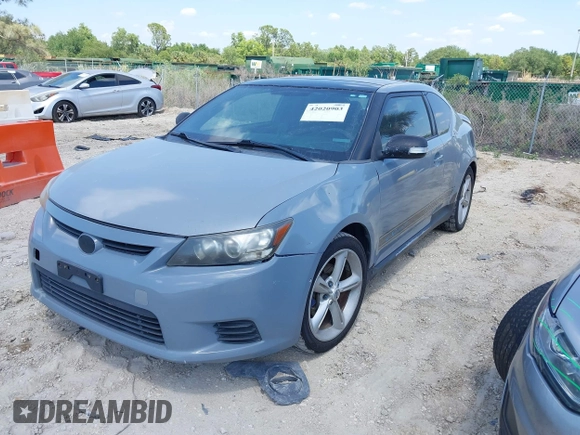 2012 Scion tC with VIN JTKJF5C79C3043661, listed as a IAAI auction lot 42020903 with 184,891 mi miles. Bid and sale history available at carsss.com. Image 2.