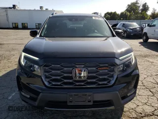 2022 Honda Passport TrailSport with VIN 5FNYF8H6XNB003764, listed as a Copart auction lot 56180195 with 61,515 mi miles and Salvage title. Bid and sale history available at DreamBid. Image 5.