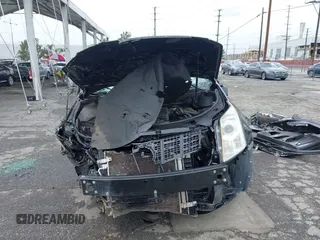2015 Cadillac SRX with VIN 3GYFNAE36FS573940, listed as a IAAI auction lot 41808779 with Not Provided miles and . Bid and sale history available at DreamBid. Image 6.