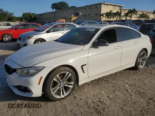 2015 BMW 4 Series 428i with VIN WBA4A5C50FG052177, listed as a Copart auction lot 86093994 with 127,956 mi miles and Salvage Title. Bid and sale history available at carsss.com. Image 1.