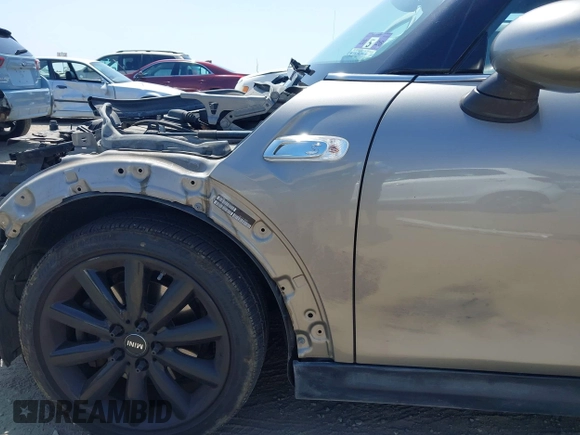 2017 MINI Hardtop Cooper S with VIN WMWXP7C34H2C61768, listed as a IAAI auction lot 42579522 with 67,876 mi miles and . Bid and sale history available at DreamBid. Image 19.