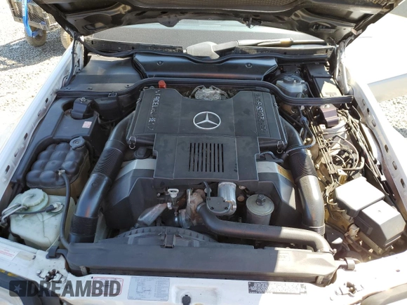 1992 Mercedes-Benz 500 z VIN WDBFA66E7NF049079, wystawiony jako Copart lot #52642285 z przebiegiem 69 976 mil mil oraz Szkody całkowita. Historia ofert i sprzedaży dostępna na DreamBid. Obrazek 11.