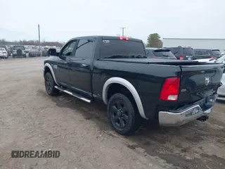 2016 Ram 2500 z VIN 3C6TR4DT2GG374847, wystawiony jako IAAI lot #41745565 z przebiegiem 164 099 mil mil oraz . Historia ofert i sprzedaży dostępna na DreamBid. Obrazek 3.