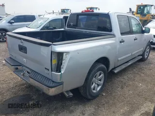 2013 Nissan Titan SV with VIN 1N6AA0EK2DN302357, listed as a IAAI auction lot 42161579 with 199,438 mi miles and . Bid and sale history available at DreamBid. Image 4.