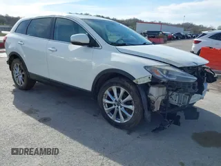 2014 Mazda CX-9 Grand Touring with VIN JM3TB3DA8E0427369, listed as a IAAI auction lot 41860129 with 152,888 mi miles and . Bid and sale history available at DreamBid. Image 1.