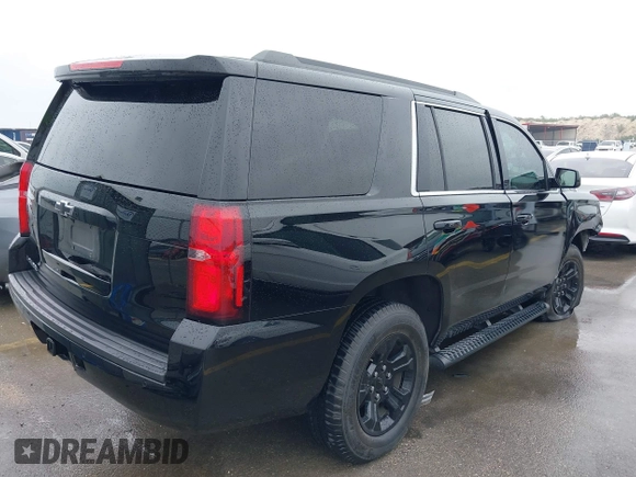 2020 Chevrolet Tahoe LS with VIN 1GNSCAKC5LR275173, listed as a IAAI auction lot 41931311 with 86,780 mi miles and . Bid and sale history available at DreamBid. Image 4.