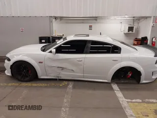 2021 Dodge Charger Scat Pack with VIN 2C3CDXGJ6MH563553, listed as a IAAI auction lot 41745898 with 39,844 mi miles and . Bid and sale history available at DreamBid. Image 14.