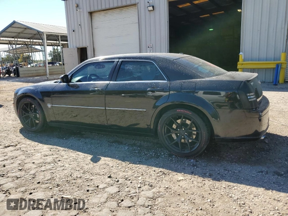 2006 Chrysler 300 C SRT8 with VIN 2C3LA73WX6H362039, listed as a Copart auction lot 76376204 with 171,165 mi miles and Clean Title. Bid and sale history available at carsss.com. Image 2.