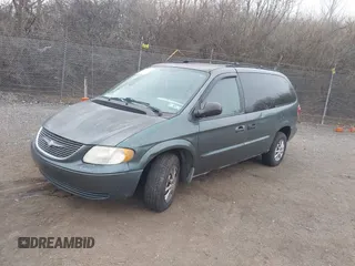 2003 Chrysler Town & Country with VIN 2C4GP24R43R255341, listed as a IAAI auction lot 41687331 with 129,592 mi miles. Bid and sale history available at carsss.com. Image 2.