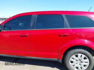 2015 Dodge Journey SE z VIN 3C4PDCAB9FT587668, wystawiony jako IAAI lot #41868556 z przebiegiem 99 695 mil mil oraz . Historia ofert i sprzedaży dostępna na DreamBid. Obrazek 14.