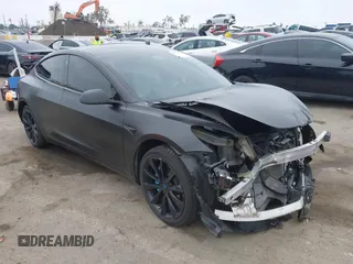 2019 Tesla Model 3 Mid Range with VIN 5YJ3E1EA8KF538083, listed as a IAAI auction lot 41891458 with 46,958 mi miles. Bid and sale history available at carsss.com. Image 1.