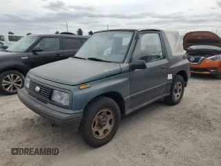 1994 Geo Tracker z VIN 2CNBE18U1R6918878, wystawiony jako Copart lot #75894834 z przebiegiem Nie podano mil oraz Nie do naprawy. Historia ofert i sprzedaży dostępna na DreamBid. Obrazek 1.