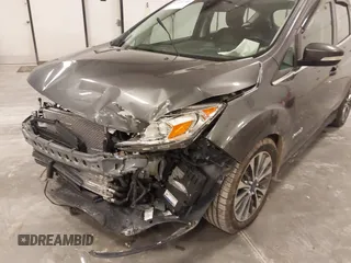 2018 Ford C-Max Titanium with VIN 1FADP5DU5JL101340, listed as a IAAI auction lot 41816730 with 102,207 mi miles and . Bid and sale history available at DreamBid. Image 6.