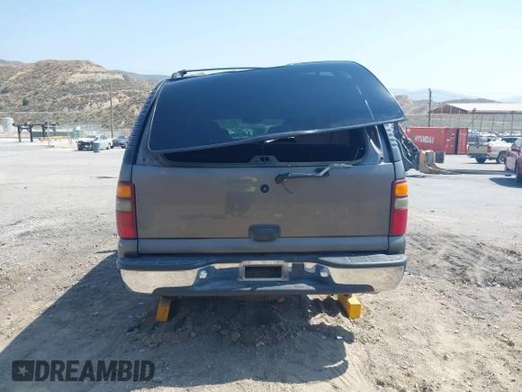 2001 Chevrolet Tahoe LS z VIN 1GNEC13T51J153677, wystawiony jako IAAI lot #42459552 z przebiegiem 201 209 mil mil oraz . Historia ofert i sprzedaży dostępna na DreamBid. Obrazek 16.