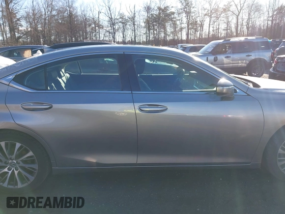 2020 Lexus ES with VIN 58ADZ1B13LU073464, listed as a IAAI auction lot 41195303 with 57,991 mi miles. Bid and sale history available at carsss.com. Image 13.