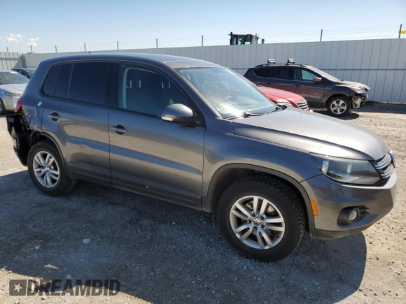 2012 Volkswagen Tiguan SE z VIN WVGAV7AX2CW004364, wystawiony jako Copart lot #55408655 z przebiegiem 271 198 mil mil oraz Szkoda całkowita • Salvage title. Historia ofert i sprzedaży dostępna na DreamBid. Obrazek 4.