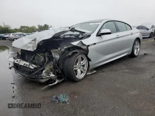 2015 BMW 6 Series 640i xDrive with VIN WBA6B8C54FD453238, listed as a Copart auction lot 73280224 with 87,201 mi miles and Salvage Title. Bid and sale history available at DreamBid. Image 1.