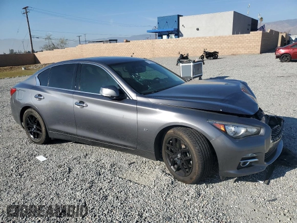 2014 Infiniti Q50 Premium with VIN JN1BV7AP3EM690697, listed as a Copart auction lot 87107684 with 82,862 mi miles and Salvage Title. Bid and sale history available at carsss.com. Image 4.