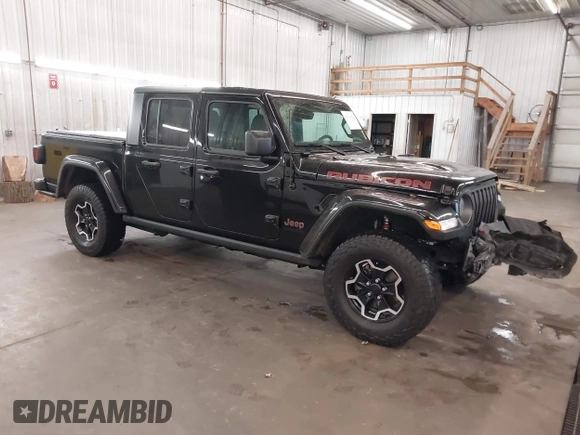 2021 Jeep Gladiator Rubicon with VIN 1C6JJTBGXML529108, listed as a IAAI auction lot 42139924 with 32,204 mi miles and . Bid and sale history available at DreamBid. Image 1.