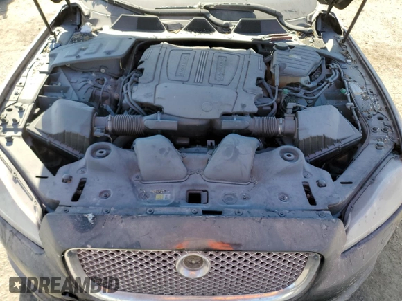 2015 Jaguar XJ with VIN SAJWJ1CD1F8V90815, listed as a Copart auction lot 77977464 with Not provided miles and Salvage title. Bid and sale history available at DreamBid. Image 11.