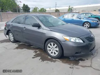 2009 Toyota Camry Hybrid with VIN 4T1BB46K09U103133, listed as a IAAI auction lot 42078242 with 245,455 mi miles. Bid and sale history available at carsss.com. Image 1.