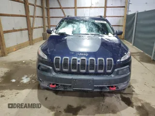 2014 Jeep Cherokee Trailhawk with VIN 1C4PJMBB9EW124371, listed as a Copart auction lot 42038105 with 137,717 mi miles and Salvage Title. Bid and sale history available at carsss.com. Image 5.