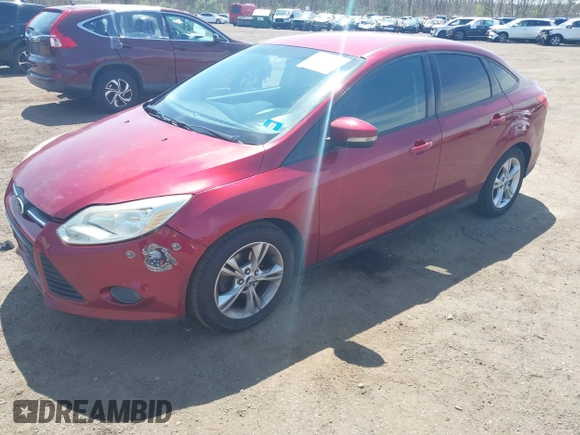 2013 Ford Focus SE with VIN 1FADP3F2XDL371376, listed as a IAAI auction lot 42074806 with 152,836 mi miles. Bid and sale history available at carsss.com. Image 2.