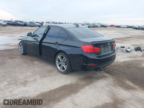 2014 BMW 3 Series 328i xDrive with VIN WBA3B3G57ENR82319, listed as a IAAI auction lot 41655950 with 130,926 mi miles. Bid and sale history available at carsss.com. Image 3.