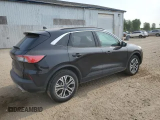 2021 Ford Escape SEL with VIN 1FMCU9H60MUA65018, listed as a Copart auction lot 60699275 with 102,828 mi miles and Clean title. Bid and sale history available at DreamBid. Image 3.