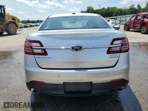 2018 Ford Taurus SEL z VIN 1FAHP2E85JG124787, wystawiony jako Copart lot #61688035 z przebiegiem 145 841 mil mil oraz Szkoda całkowita • Salvage title. Historia ofert i sprzedaży dostępna na DreamBid. Obrazek 6.