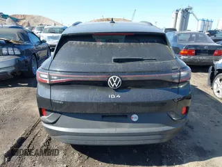 2023 Volkswagen ID.4 Pro with VIN 1V2CMPE8XPC018893, listed as a IAAI auction lot 41694083 with 31,875 mi miles and . Bid and sale history available at DreamBid. Image 16.