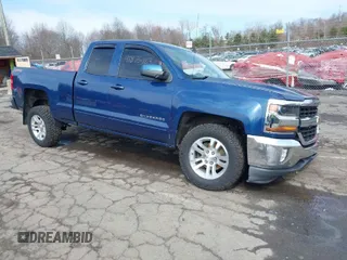 2017 Chevrolet Silverado 1500 LT with VIN 1GCVKREC1HZ273513, listed as a IAAI auction lot 41875769 with 153,164 mi miles. Bid and sale history available at carsss.com. Image 1.